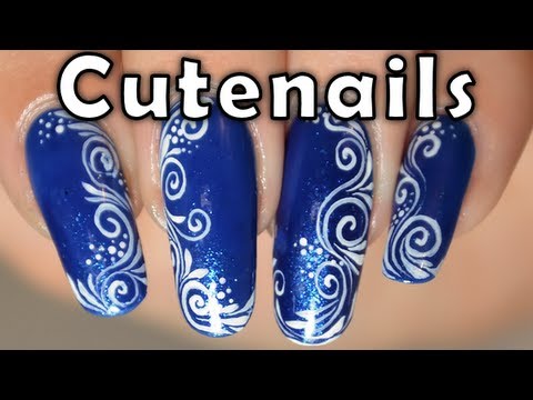 Blue Nails With White Spiral Flowers Design Nail Art