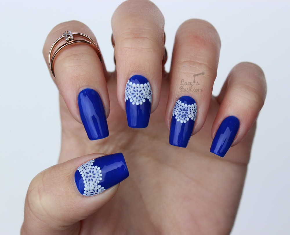 Blue Nails With White ace Design Idea