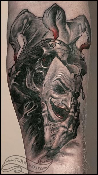 Brilliant Grey Ink Evil Jester Holding Mask Tattoo On Arm Sleeve