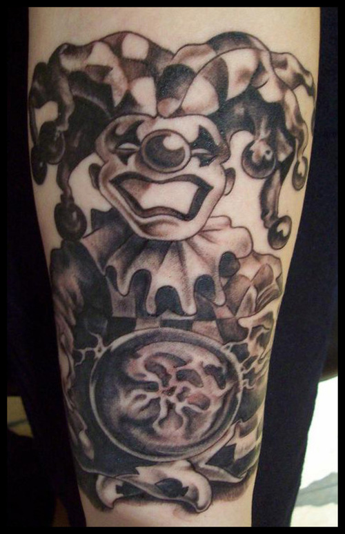 Brilliant Grey Ink Evil Jester Tattoo On Arm Sleeve