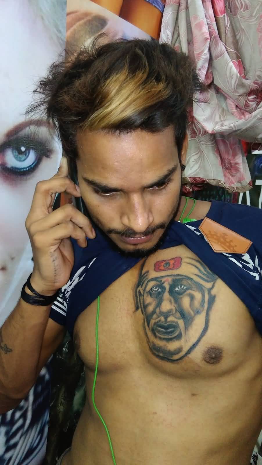 Brilliant Sai Baba Face Tattoo On Chest