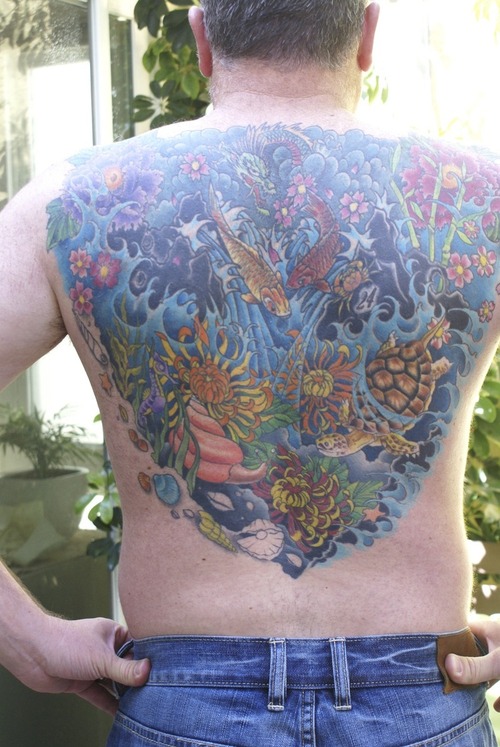 Colored Sea With Sea Creatures Back Body Tattoo