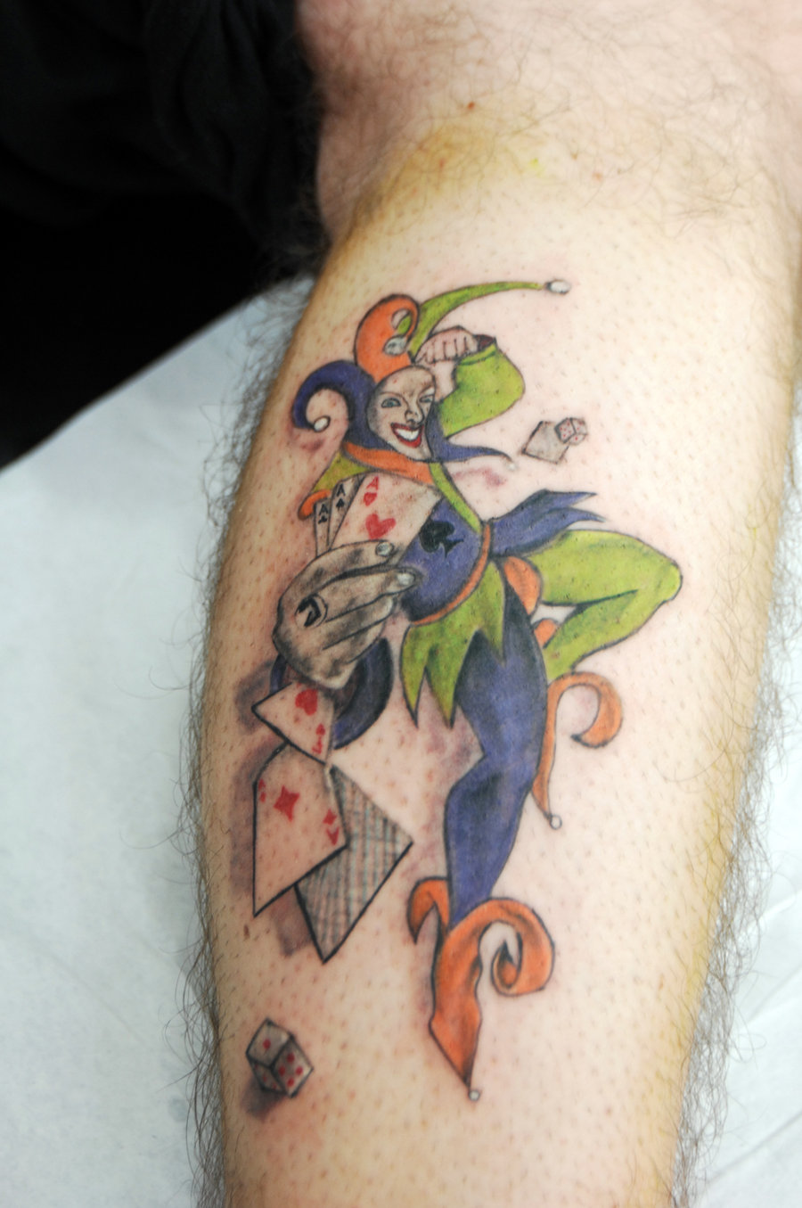 Colorful Jester Showing Cards Color Tattoo By Crazyneedletattoo