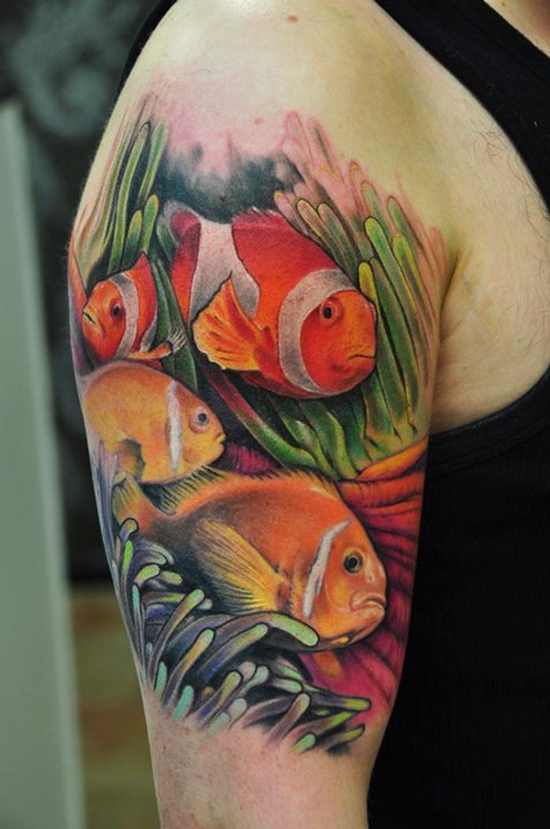 Colorful Realistic Saltwater Fishes Tattoo On Right Shoulder