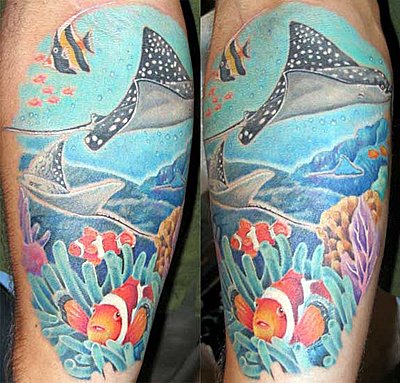 Colorful Saltwater Fishes In Sea View Tattoo