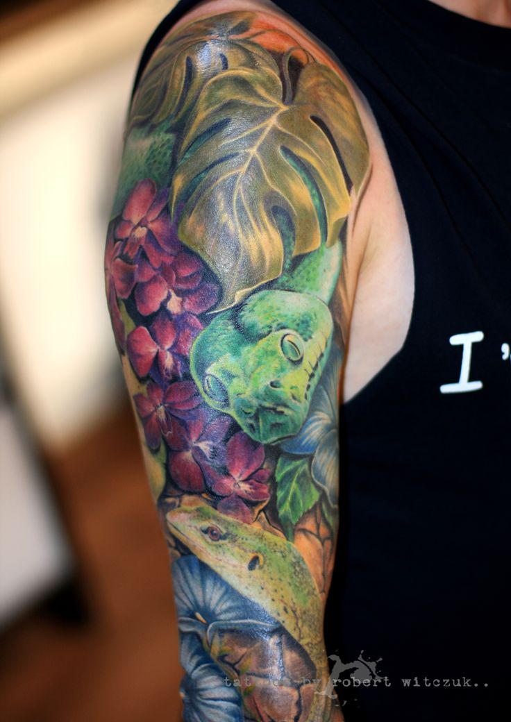 Colorful Two Reptile Snakes With Leaves Tattoo On Sleeve