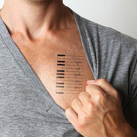 Cool Piano Keys With Words Tattoo On Chest