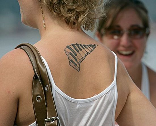 Cool Small Piano Keys Tattoo On Upper Back For Girl
