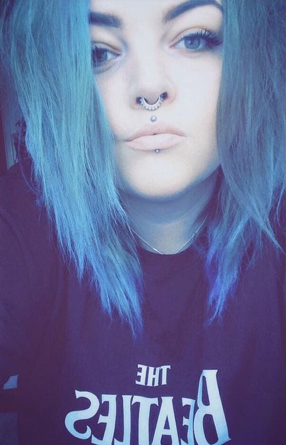 Cute Girl With Septum And Cyber Bites Piercing