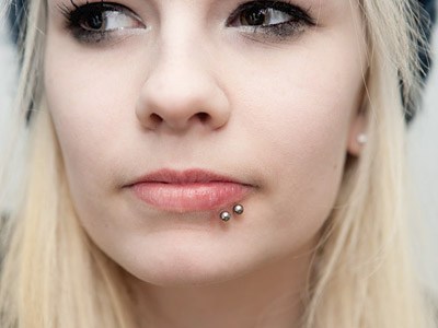 Cute Girl With Spider Bite Piercing