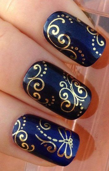 Dark Blue Nails With Golden Flowers Design Idea