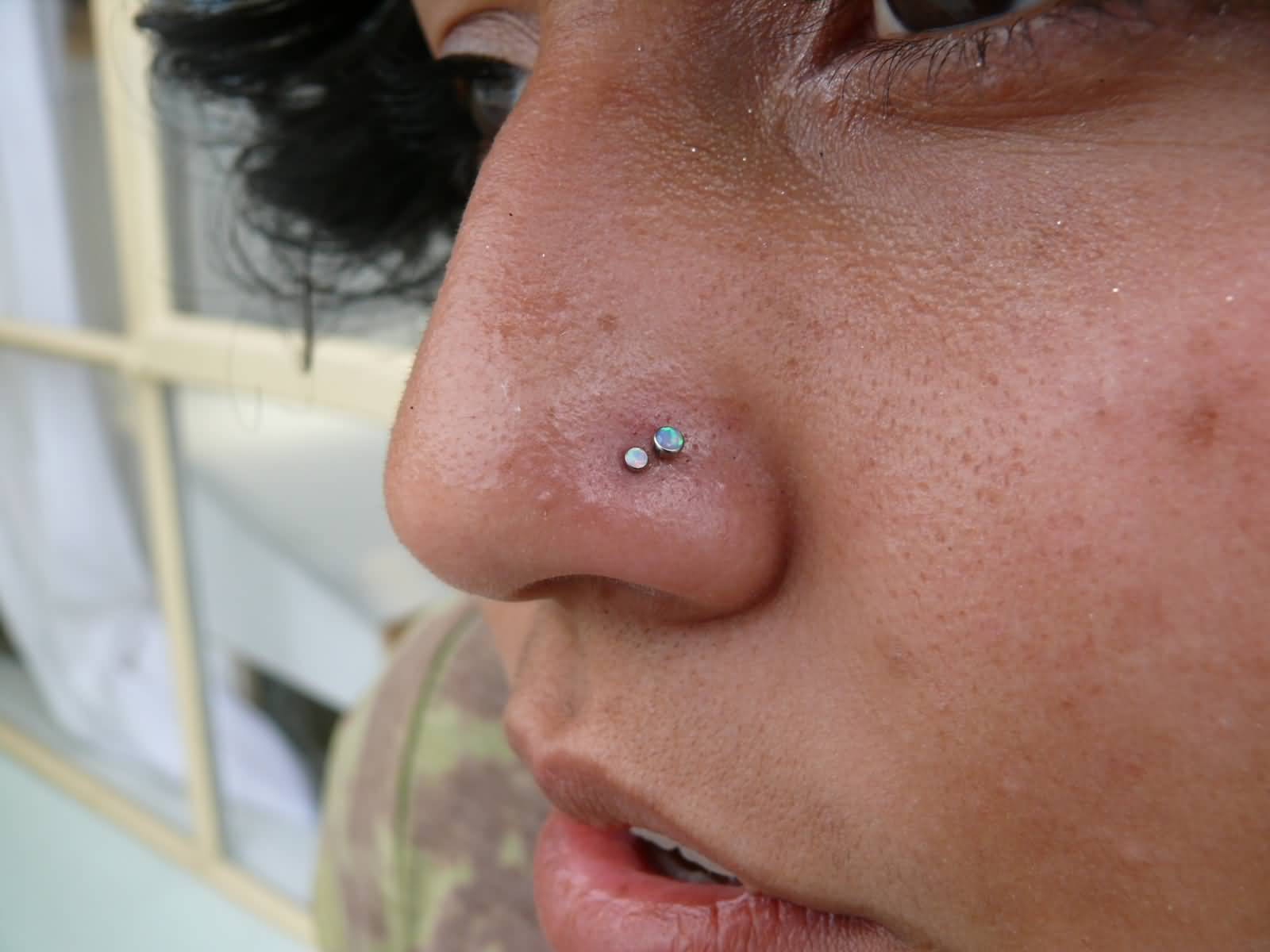 Double Nostril Piercing With Small Studs