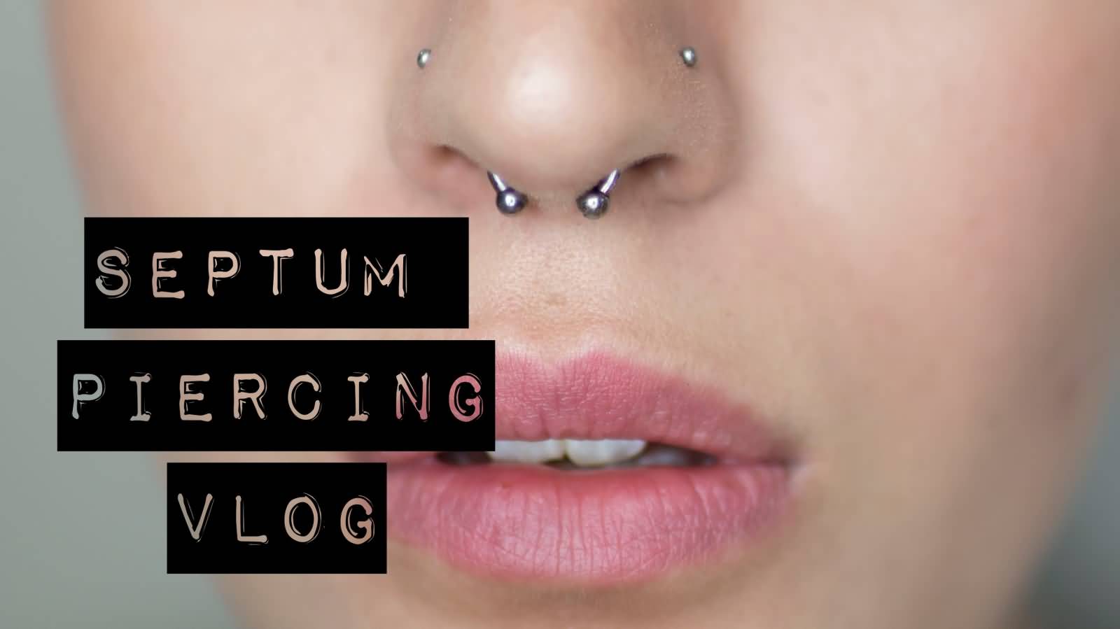 Dual Nostril And Septum Piercing With Circular Barbell