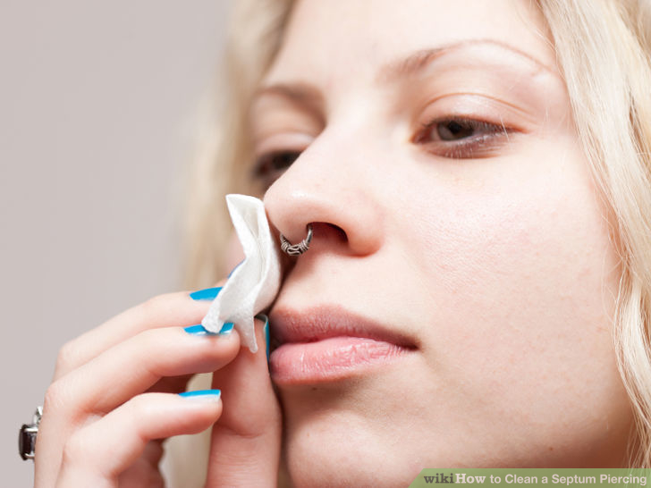 Girl Showing Her Nose Septum Piercing