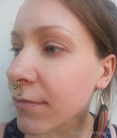 Girl With Cyber Bites And Septum Piercing