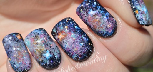 Glittery Galaxy Nail Design Idea