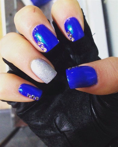 Glossy Blue Nails With Accent Silver Nail Art