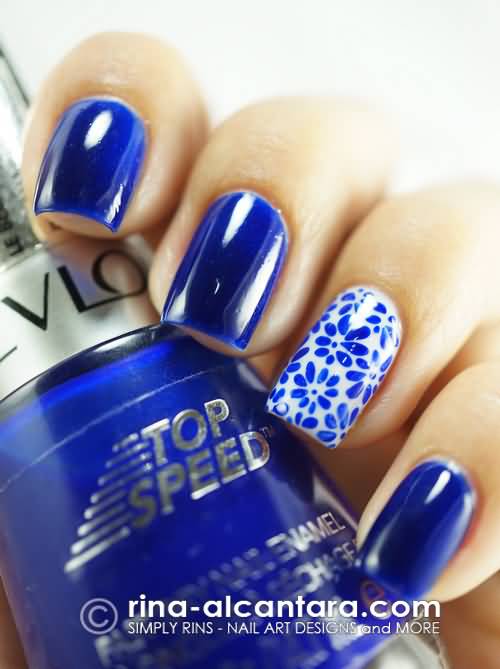 Glossy Royal Blue With Accent Flowers Design Nail Art