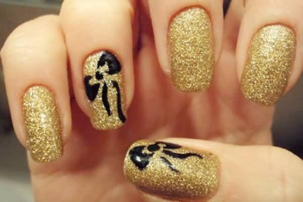 Gold Glitter Nail Art With Black Bow Design