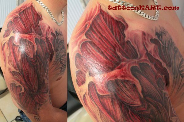 Great 3D Muscles Tattoo On Chest And Shoulder