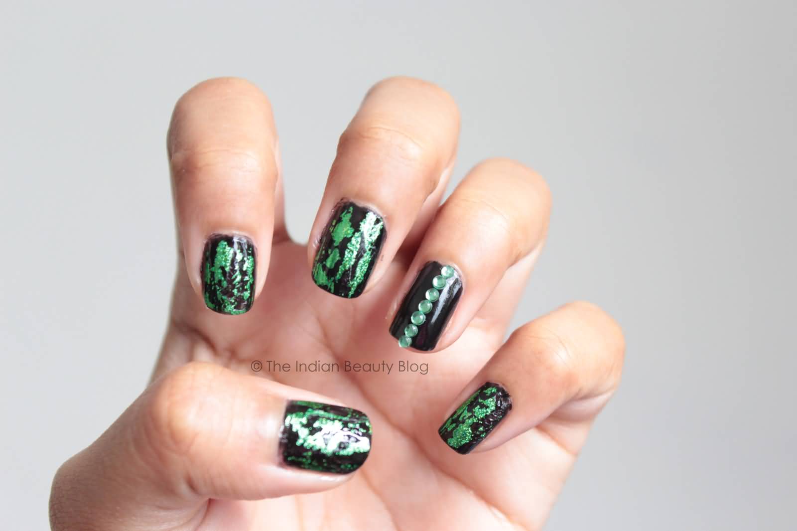 Green And Black Holographic Nail Art With Rhinestones Design