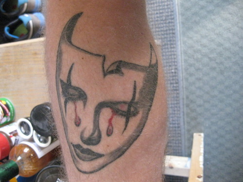 Grey Ink Crying Jester Court Tattoo