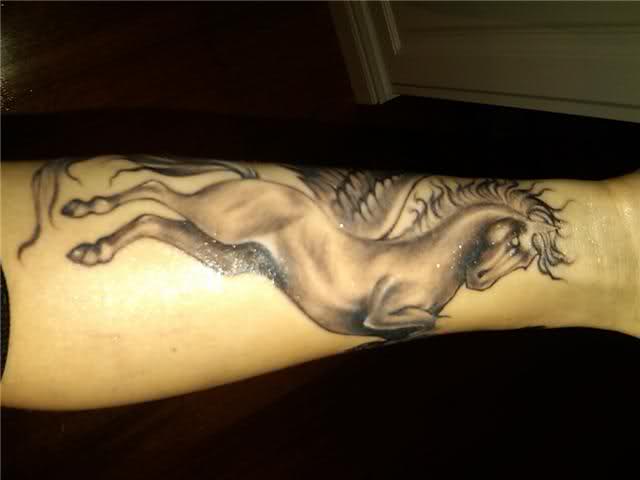Grey Ink Pegasus Tattoo On Forearm