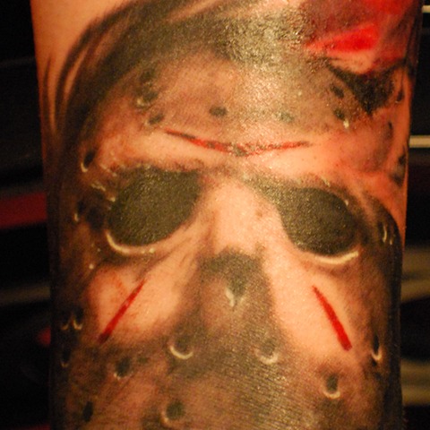Grey Ink Scary Jason Tattoo