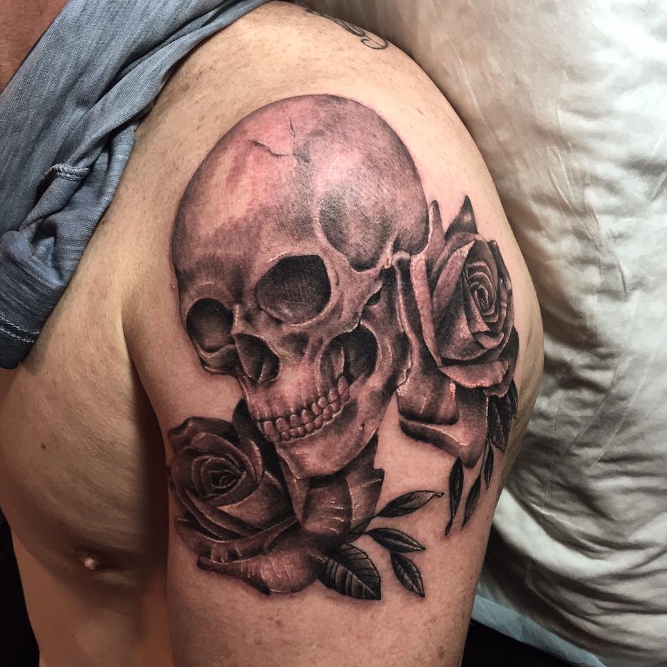 Grey Roses And Skull Tattoo On Left Shoulder by Pepi