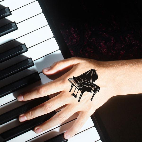 Impressive Black Ink Grand Piano Tattoo On Left Hand