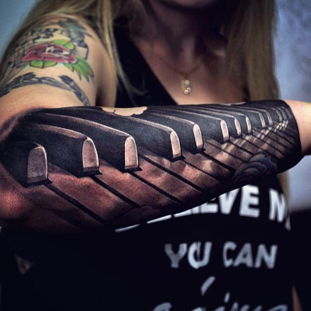 Incredible 3D Piano Keys Tattoo On Left Arm Sleeve