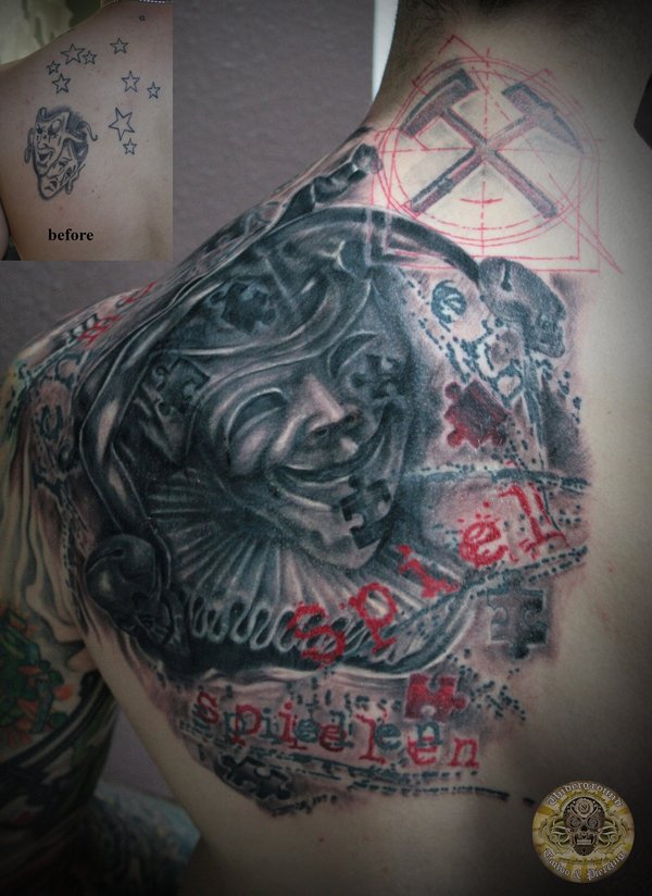 Incredible Grey Ink Jester Tattoo On Left Back Shoulder