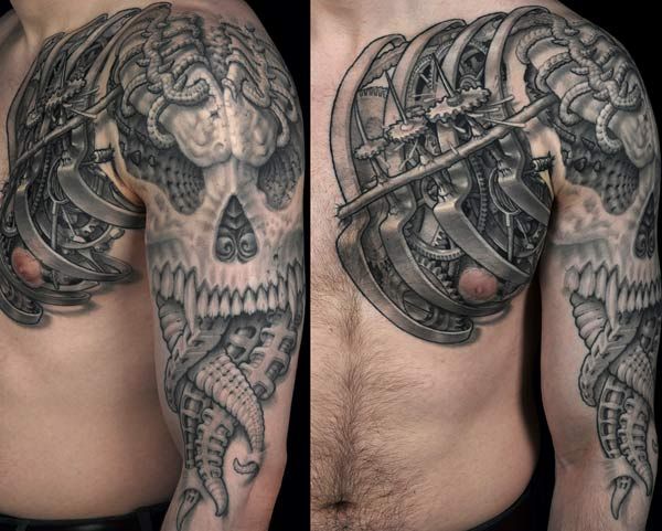 Incredible Grey Mechanical Skull Tattoo On Chest And Shoulder