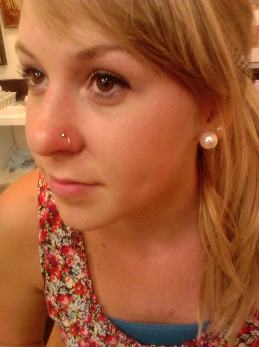 Left Ear Lobe And Nostril Piercing Idea For Girls
