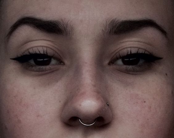 Left Nostril And Septum Piercing Picture