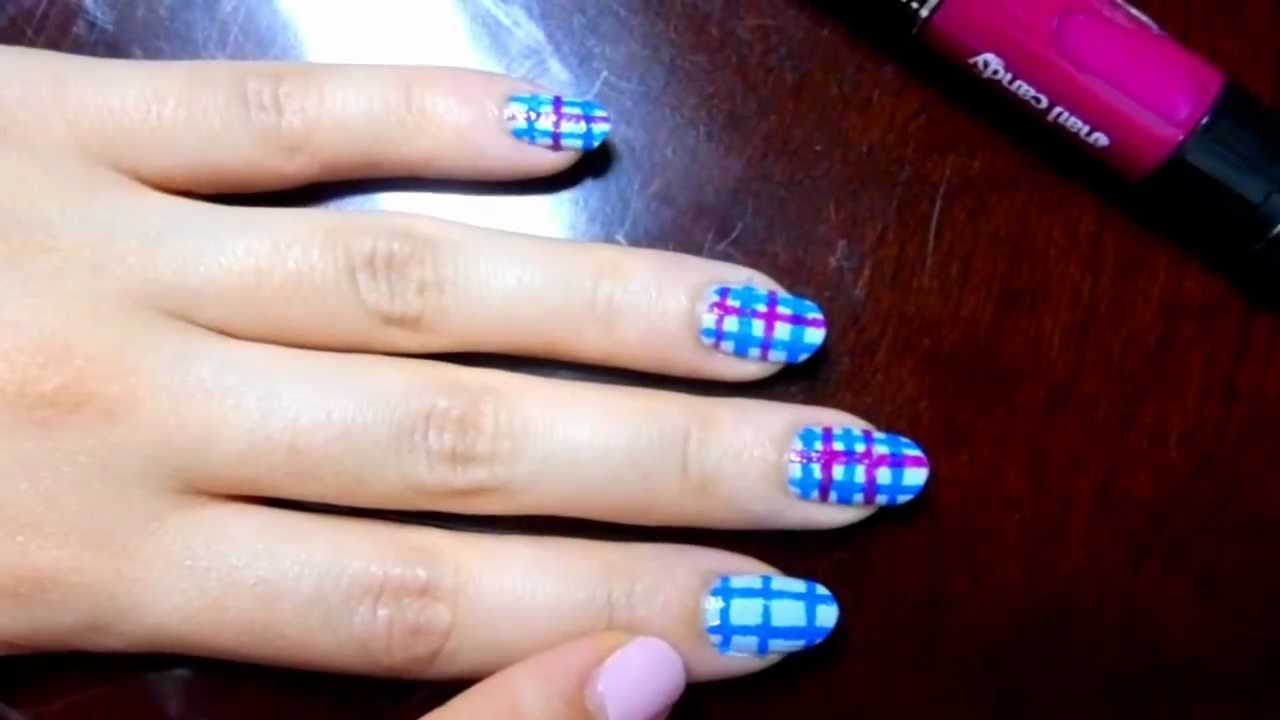 Light Blue Base Nails With Dark Blue And Purple Stripes Design Nail Art