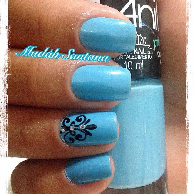 Light Blue Nails With Accent Black Floral Design Idea