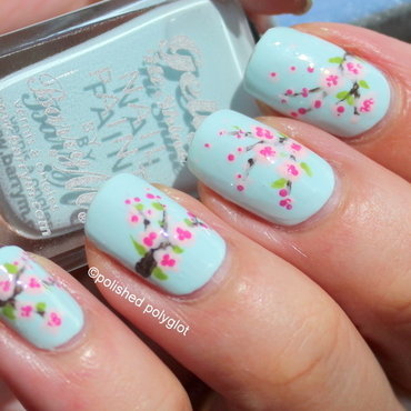 Light Blue Nails With Cherry Blossom Flowers Nail Art