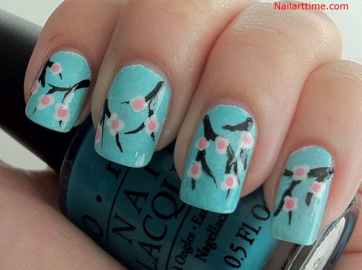 Light Blue Nails With Pink Flowers Nail Art
