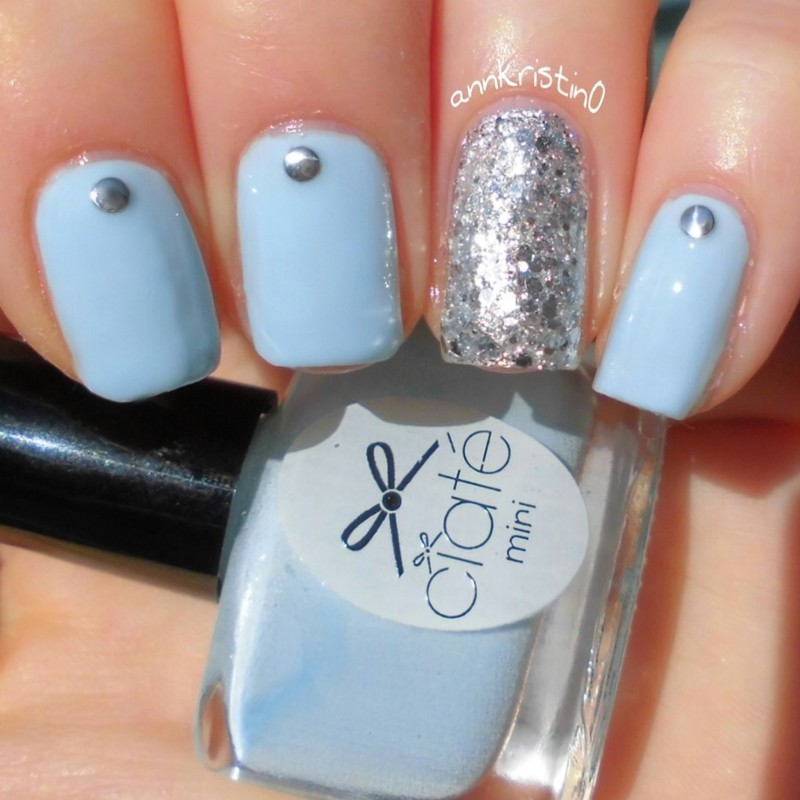 Light Blue Nails With Stud And Silver Glitter Accent Nail Art