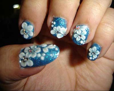 Light Blue Nails With White 3D Floral Design Nail Art