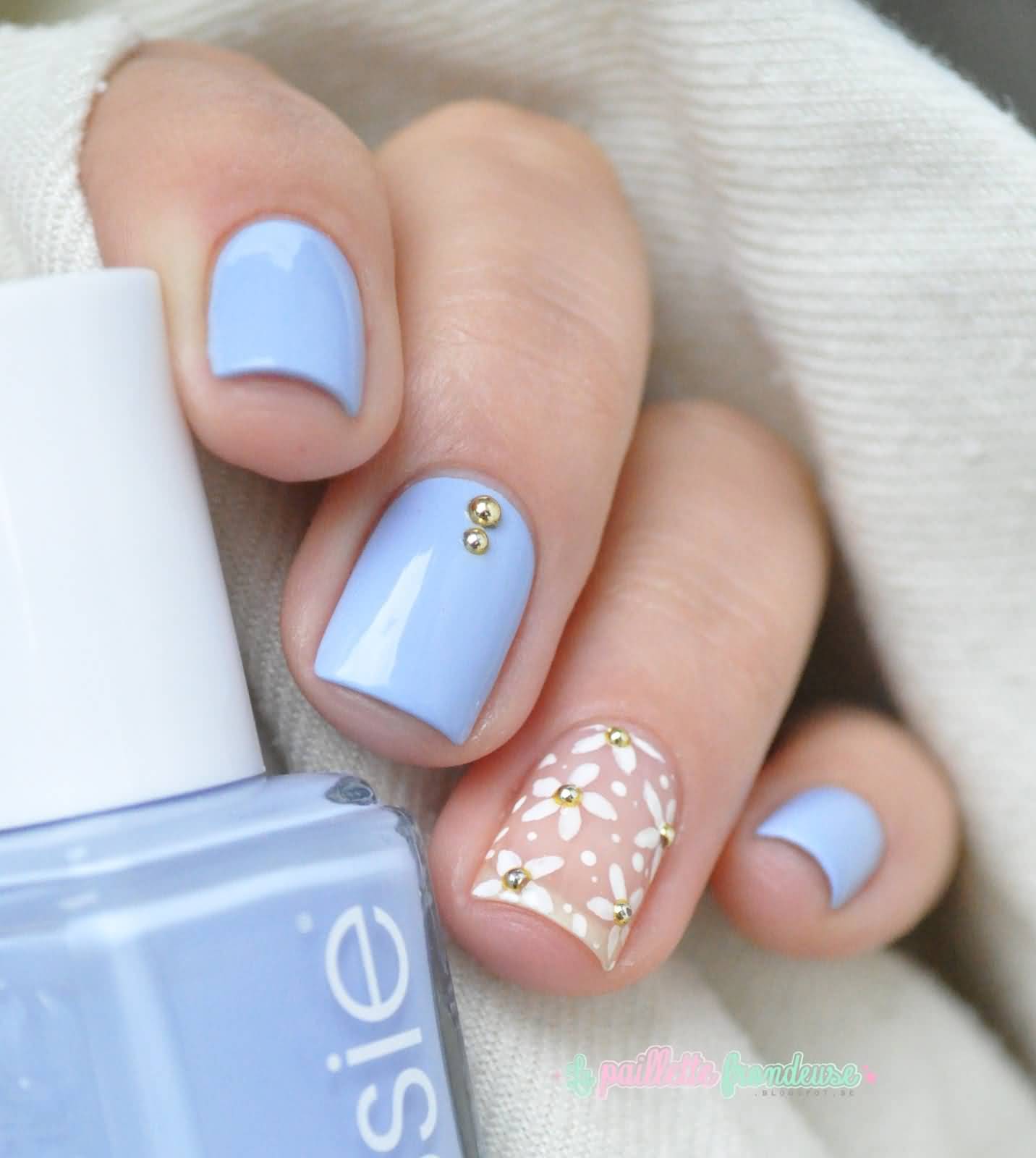 Light Blue Nails With White Floral On Nude Nail Art