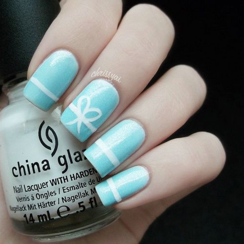 Light Blue With White Bow Design Nail Art