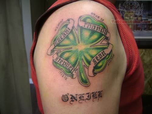 Lovely Banners On Four Leaf Shamrock Tattoo On Right Shoulder