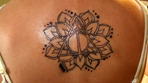 Lovely Deathly Hallows With Mandala Flower Tattoo On Upper Back