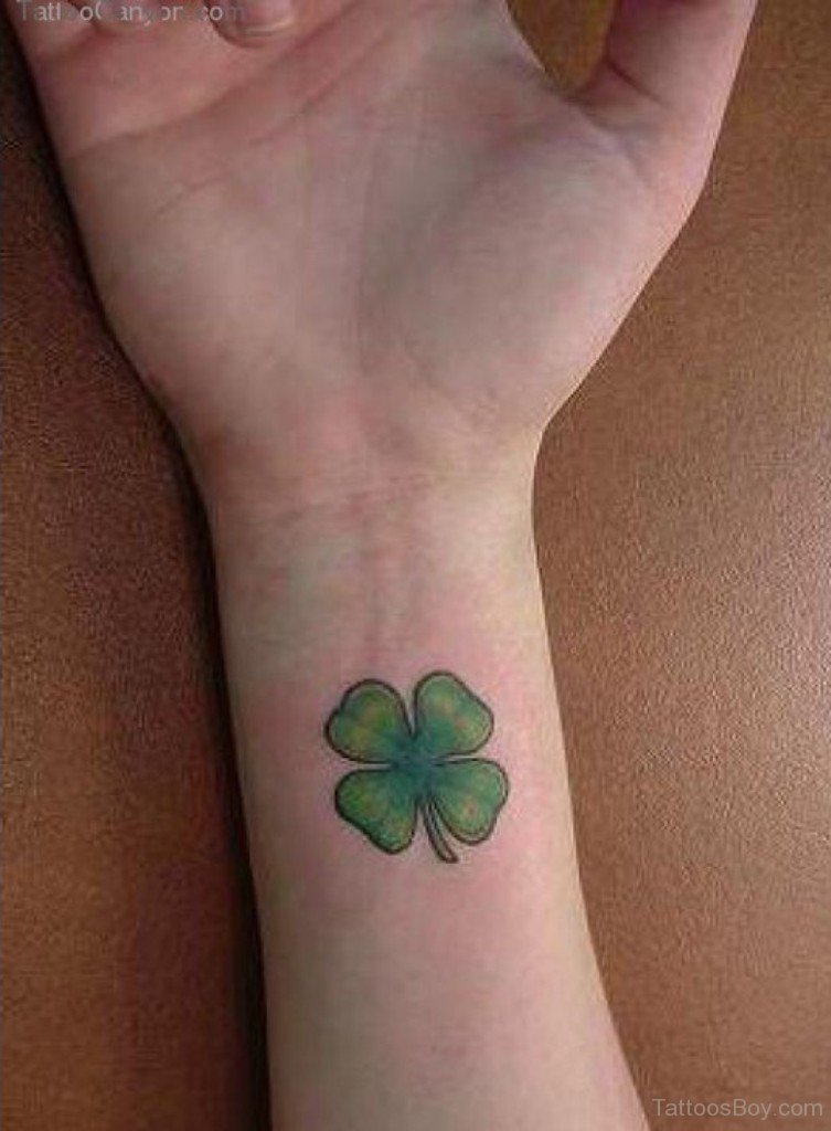 Lovely Four Leaf Shamrock Tattoo On Wrist