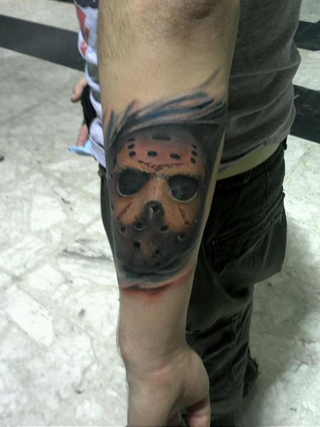 Lovely Jason Mask Tattoo On Left Arm Sleeve