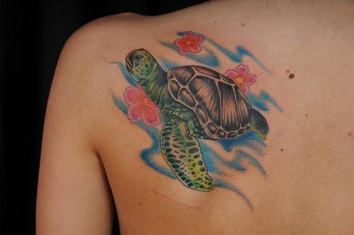 Lovely Sea Creature Turtle In Water Tattoo On Back Left Shoulder