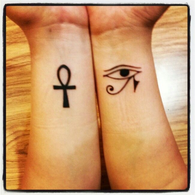 Lovely Small Ankh And Horus Eye Tattoo On Both Wrists