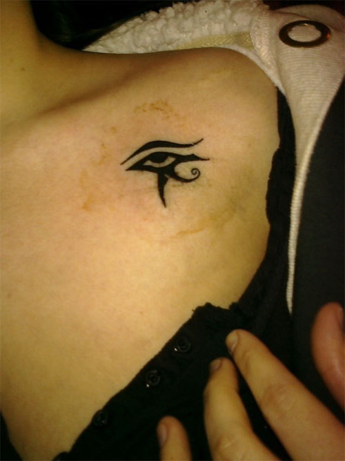 Lovely Small Horus Eye Tattoo On Left Shoulder